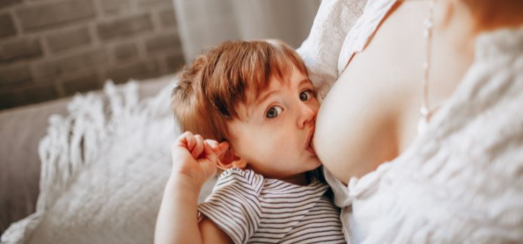 Why Do Babies Touch Your Face While Breastfeeding? Explained!